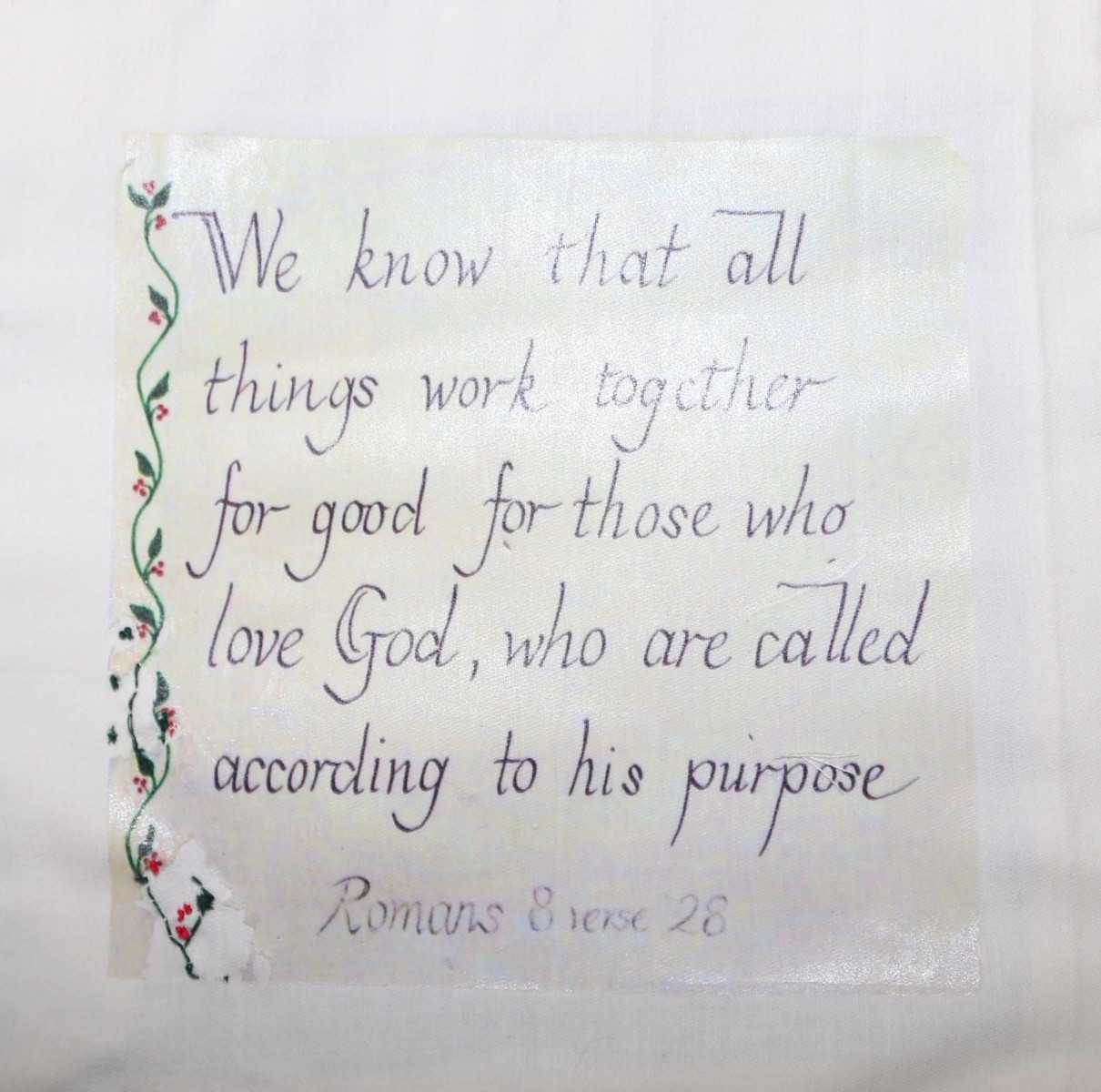 Romans 8 verse 28 in calligraphy